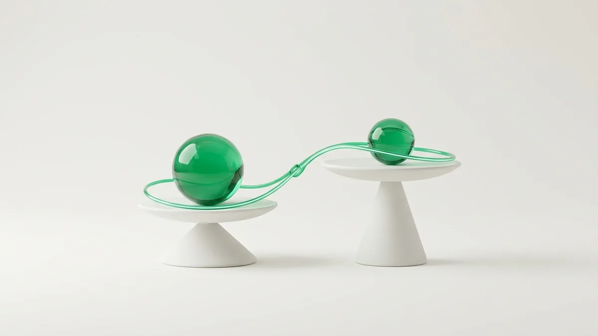 BetMGM vs DraftKings odds concept: two green glass orbs balanced at different heights on white pedestals.